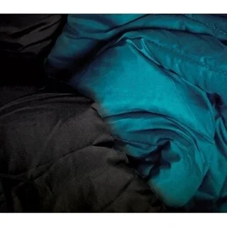 Goose down comforters known for their superior quality and insulationBYB Ocean Depths Teal/Black Reversible Twin XL Comforter