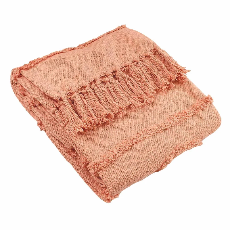 Rayon from bamboo blankets for a silky and breathable feelJakarta Tufted Throw Blush