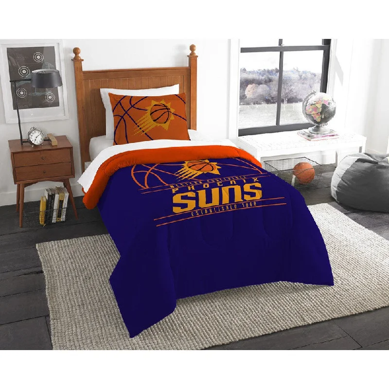 Microfiber - filled comforters that are lightweight and easy to care forThe Northwest Company NBA Phoenix Suns Reverse Slam Twin 2-piece Comforter Set