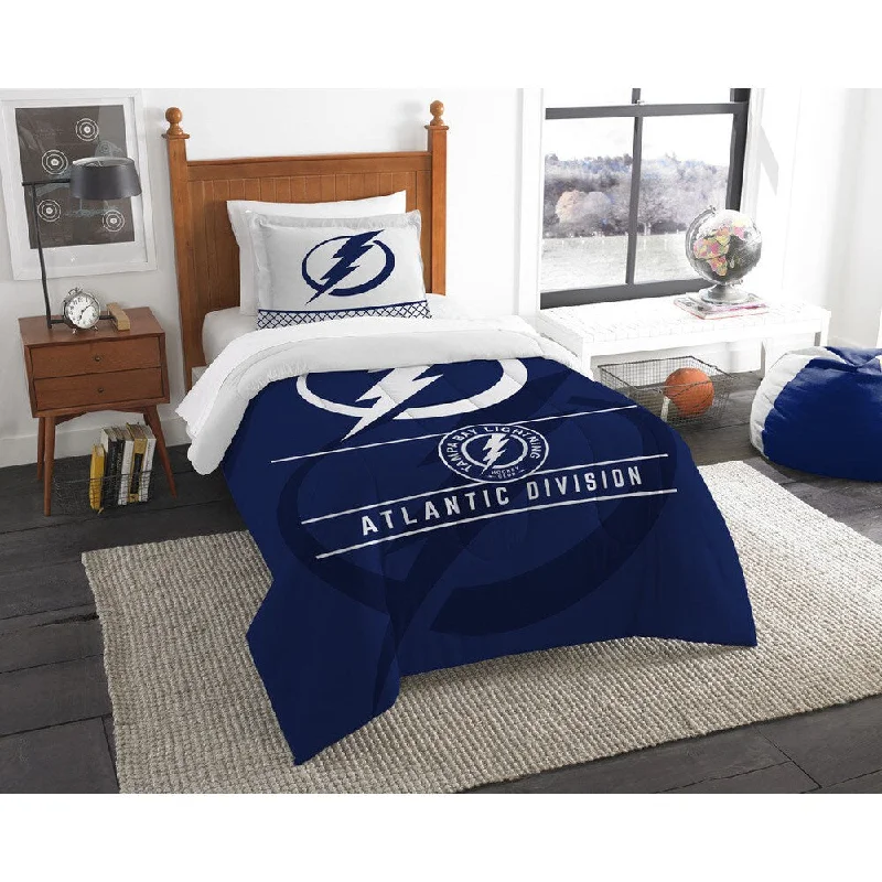 Duck down comforters with a softer feel and good warmth retentionThe Northwest Company NHL Tampa Bay Lightning Draft Blue Twin 2-piece Comforter Set