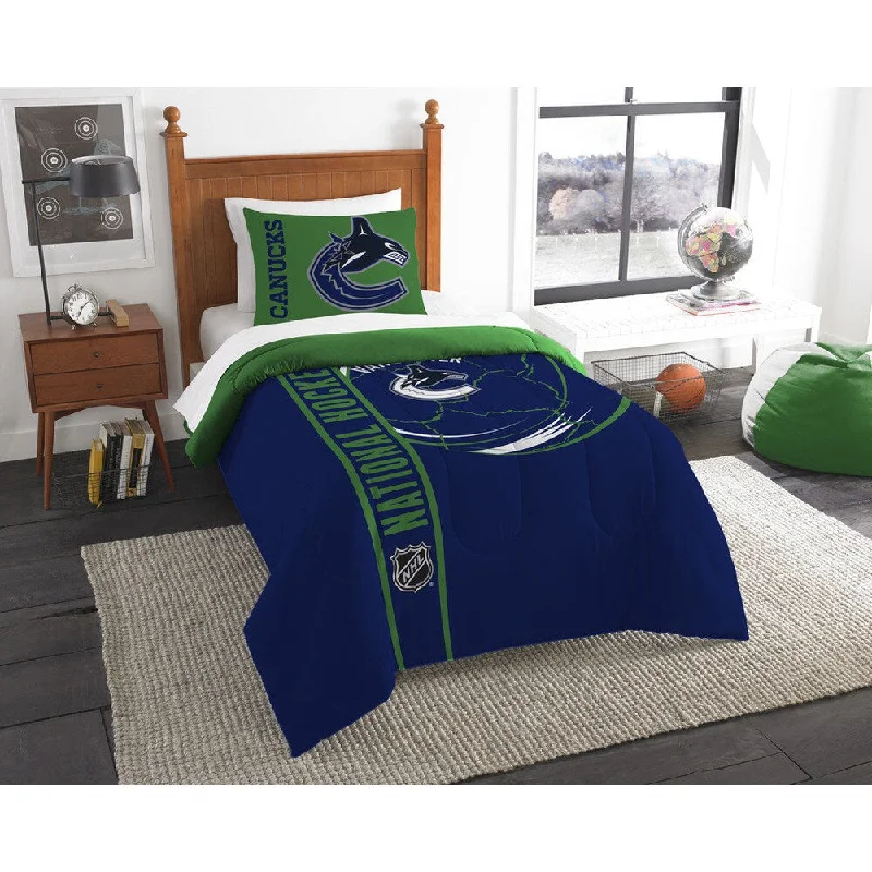 Microfiber - filled comforters that are lightweight and easy to care forThe Northwest Company Official NHL Vancouver Canucks Printed Twin 2-piece Comforter Set